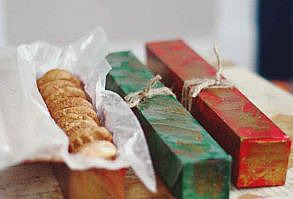 Old Saran wrap or aluminum foil containers make great boxes for gifting cookies.