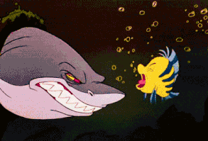 According to the DVD commentary, the shark that chases Ariel and Flounder at the beginning is named Glut, and he was planned to return for a rematch with Flounder later on.  | 17 Things You Probably Didn't Know About Disney's