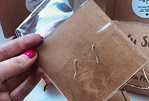 Novelty metal ( not silver) AGE earrings with cheeky piece of card. Message printed on brown piece of card approx 8cm x 8cm with the earrings on in a cellophane bag : Holy Shit! (Wear With Pride) They also come in a little brown box approx 10cmx10cm with a little bit of crafting fiber underneath ( Colour of this will vary) Sealed closed with an enjoy sticker. Comes posted in a brightly coloured sealed plastic bag. Not personalised will come as in picture. Gift message if chosen will printed out automatically on paper gift receipt ** gift messag