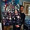Robert Downey Jr. with Avengers poster