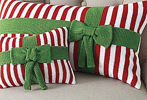 Christmas pillows. Store bought and knitted, but hey, the clever crocheter can whip these out in double crochet in no time.