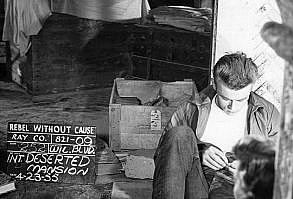 “James Dean and Natalie Wood on the set of Rebel Without a Cause. ”