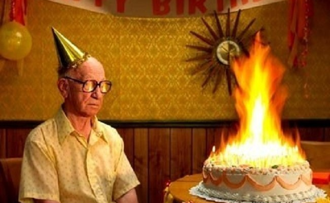 Elderly man happy birthday cake fire1-650px-cropped