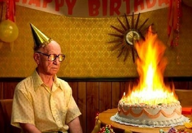 Elderly man happy birthday cake fire1-650px-cropped