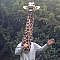This Guy Dancing With A Giraffe Puppet Will Instantly Brighten Your Day