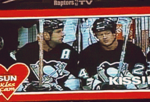 kiss cam. staring the penguins