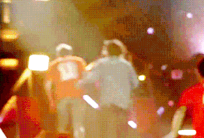 {GIF} Harry helping Niall up the ramp and the rest of the lads hauling behind them. This is the fastest I've seen Zayn run