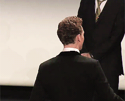 The guy in the back is literally me when ever I see a hot tom hiddleston picture