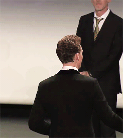 The guy in the back is literally me when ever I see a hot tom hiddleston picture