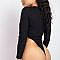 Imported S.M.L. A knit high leg bodysuit in a ribbed fabric featuring an underwire, a round neckline, long sleeves, and a snap button closure. 74% Polyester 21% Cotton 5% Spandex Black IRI High Leg Underwire Bodysuit Item Measurements: SIZE S Measurements: SIZE S Length: