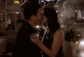 Robin runs after Ted and kisses him.