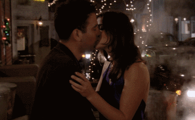 Robin runs after Ted and kisses him.