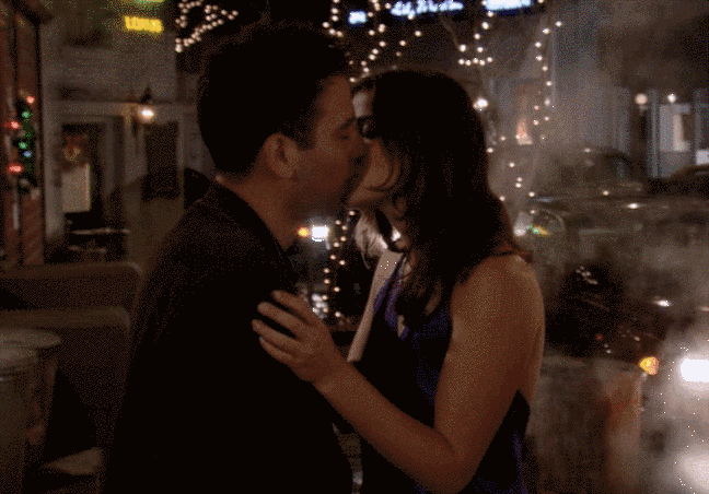 Robin runs after Ted and kisses him.