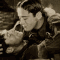 Classic Literature is gay — elia-kazan: Two men kissing in a photobooth in...