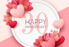 Happy wedding anniversary wish for 30 years of marriage on image of warm colors with hearts.