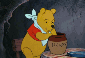 When Pooh ate honey like it was the most amazing food ever. | 17 Times Disney Made You Drool Uncontrollably For Frikkin' Cartoon Food